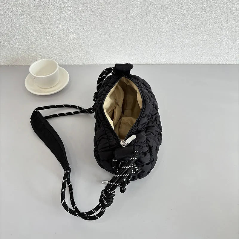 Soft pillow-shaped women's nylon messenger bag in choice of colours on adjustable crossbody strap.