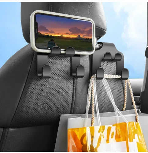 Car mounted multifunction hook made from white ABS material shown installed in vehicle