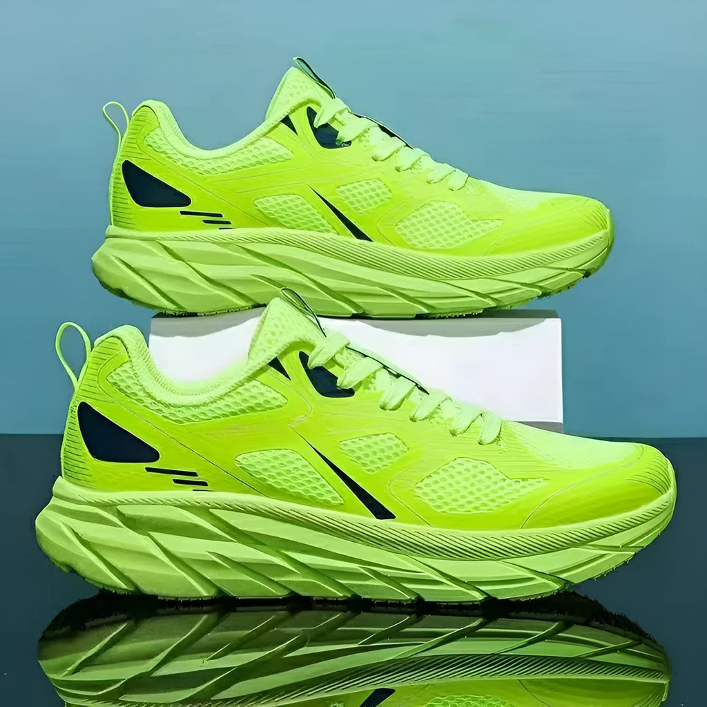 Pair of colourful mesh running shoes with round toe and plastic sole, shown in available colours.
