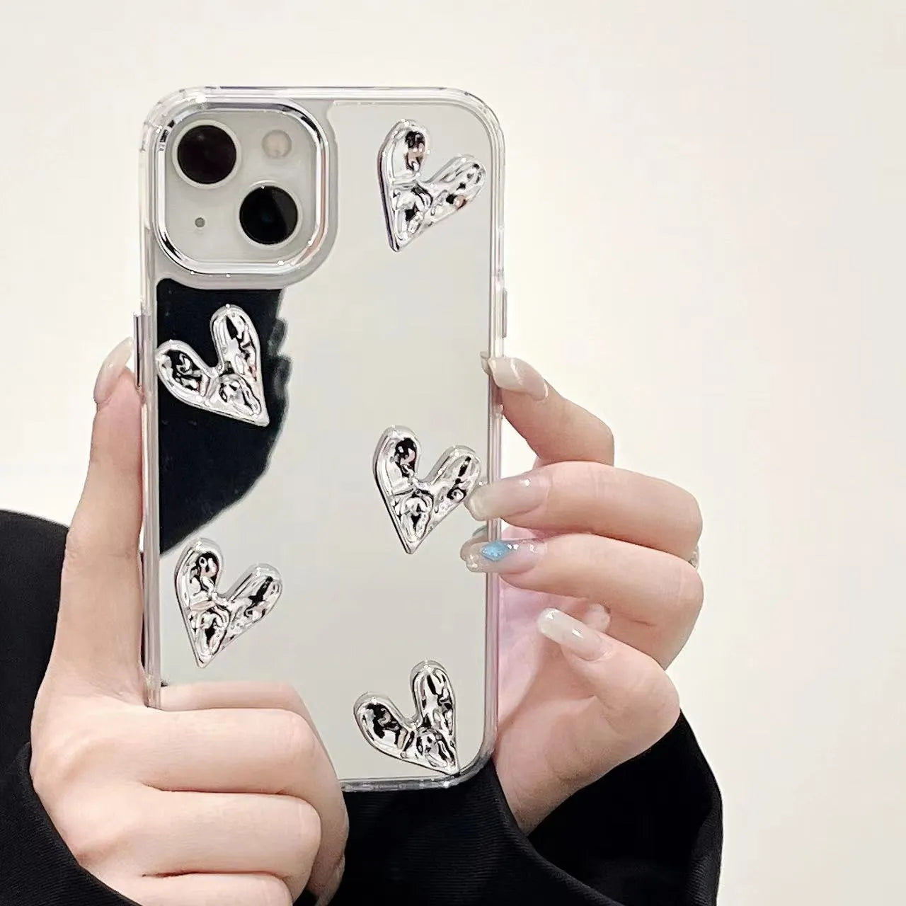 White electroplated mirror phone case for iPhone 14 Pro Max with three-dimensional love pattern and soft TPU construction