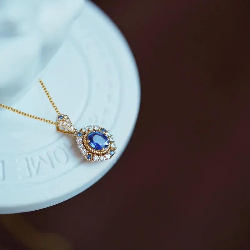 Huitan yellow gold-colour adjustable necklace with mixed gemstone and zircon pendant on a box chain.