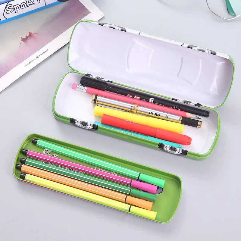 Red and blue cartoon race car design metal pencil case with double-layer trolley shape, shown with pens inside.