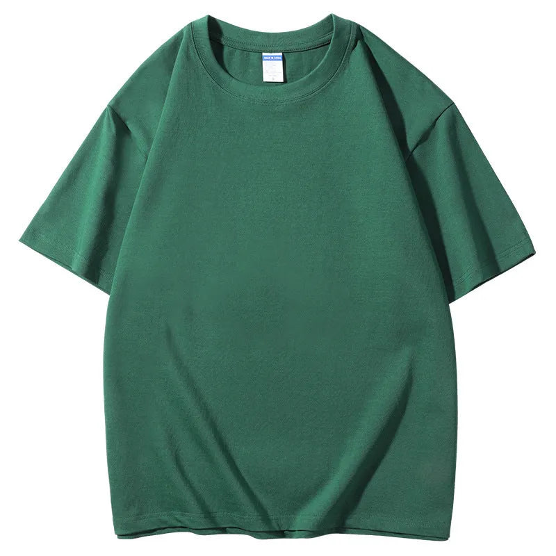 Man wearing a khaki coloured 300g cotton loose fit round neck t-shirt.