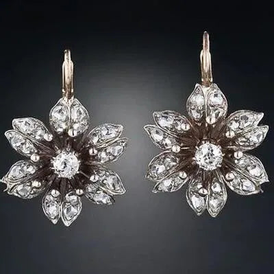 Silver retro fashion earrings with electroplated alloy construction and creative OL style design