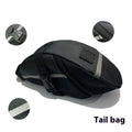 Black quick release bicycle saddle bag mounted under a bike seat
