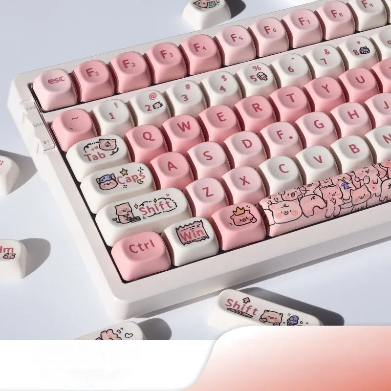 Close-up of a pink Fragrant Pig design on a white PBT plastic keycap for mechanical keyboards.