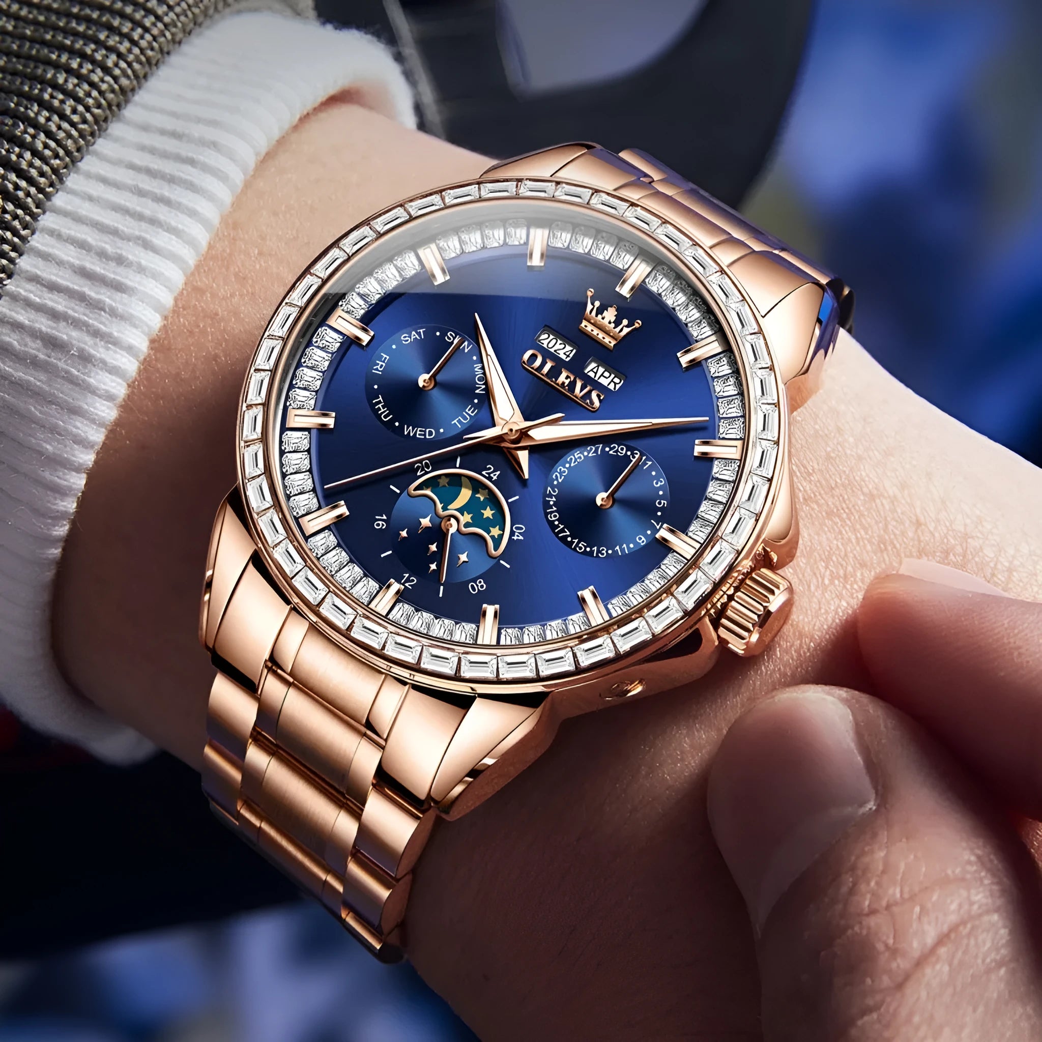Men's stainless steel automatic mechanical watch with diamond dial on wrist, showing transparent case back.