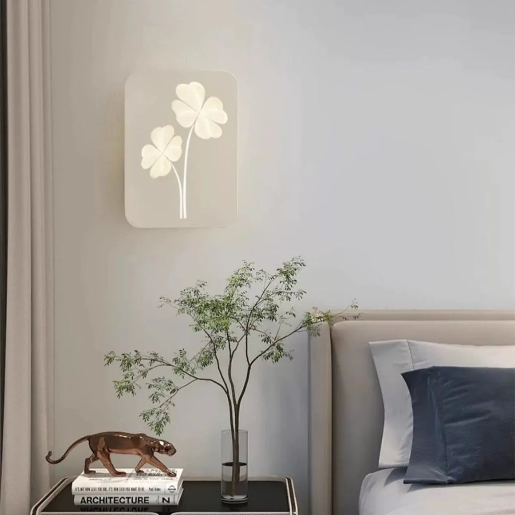 Modern wall lamp with acrylic decorative shade showing tricolour LED lighting and iron construction