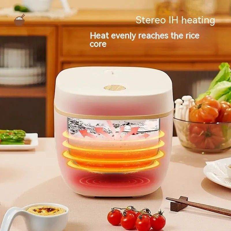 White or beige 3-litre rice cooker with black inner pot and included accessories
