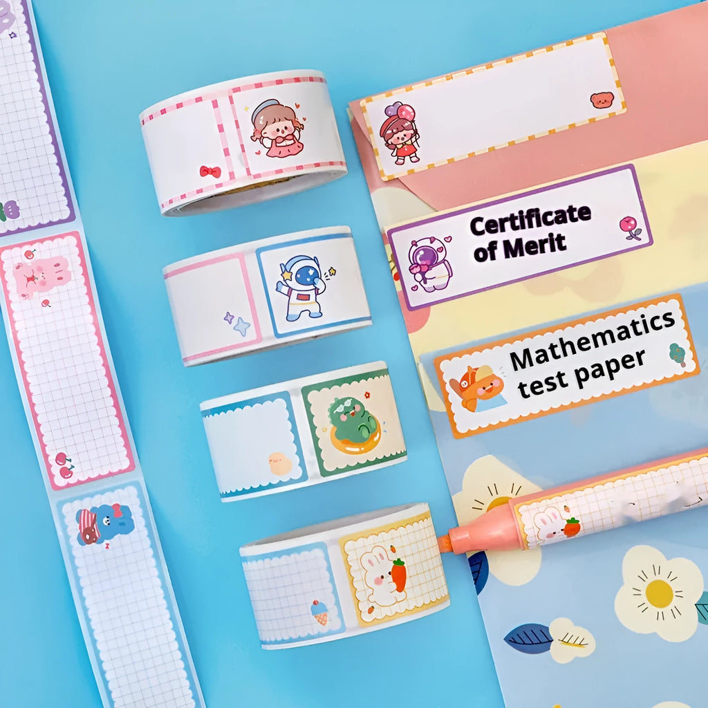 Roll of colourful cartoon name tape stickers with dinosaur and astronaut designs for labelling.