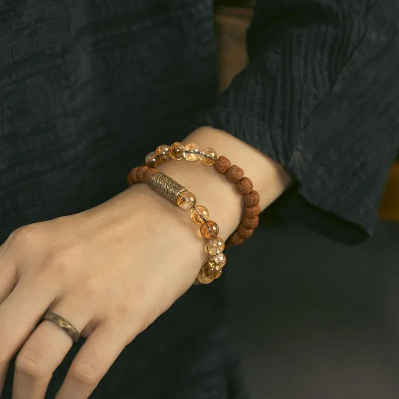 Personalised natural colour LCD double circle bracelet showing custom message on citrine display