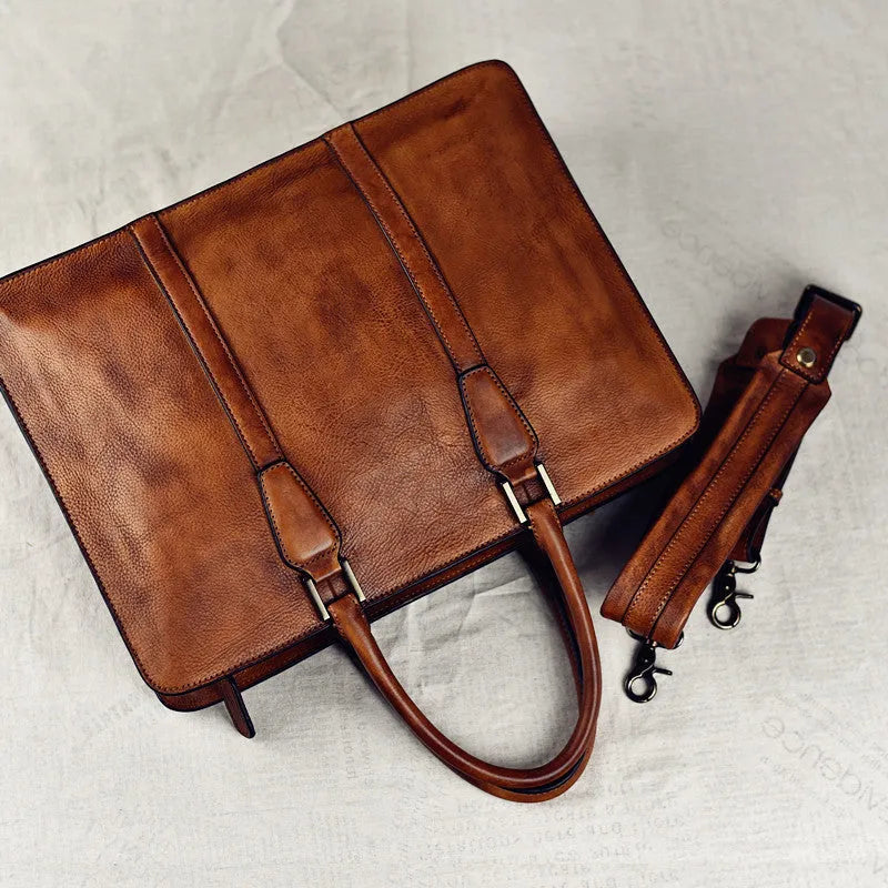 Men's brown leather handbag with horizontal square design and zipper closure