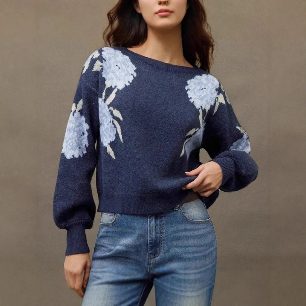 Sapphire blue women's pullover with a loose fit and an all-over floral jacquard pattern.