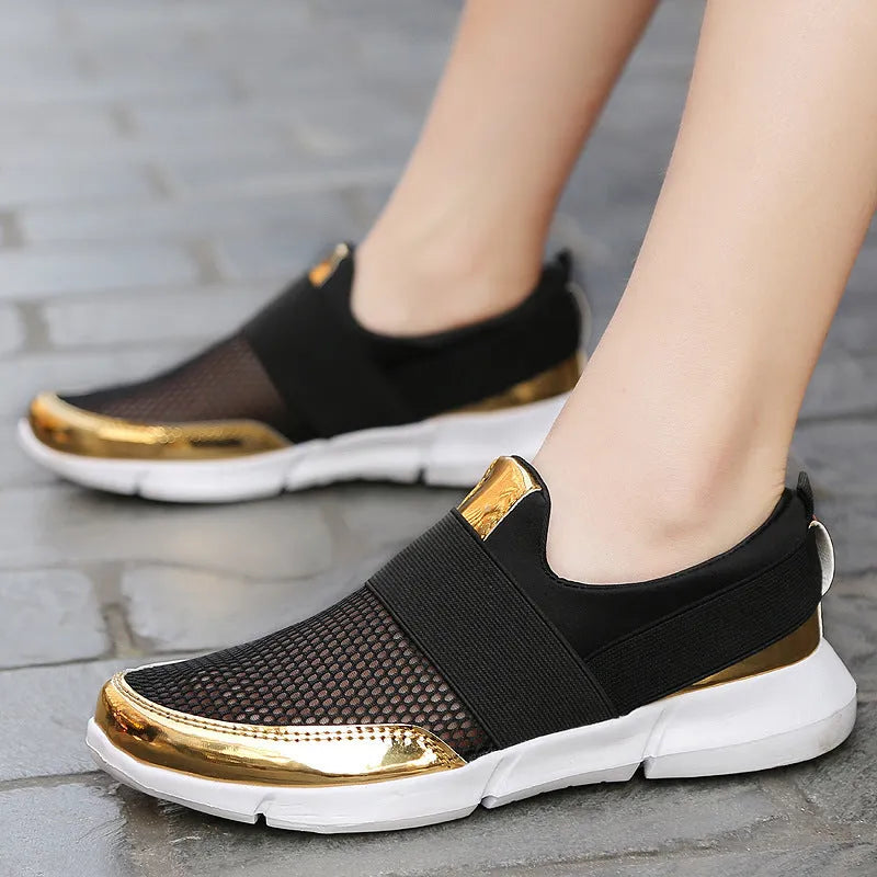 Women's breathable sneakers in black, blue, and grey with mesh lining and low tube design