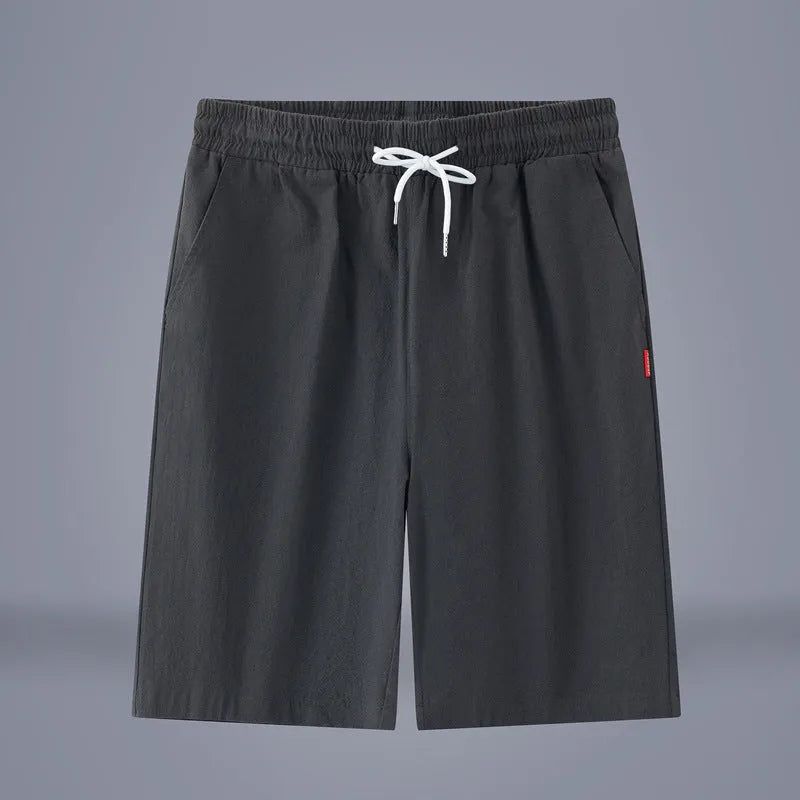 Chinese style solid colour cropped summer pants on a hanger.