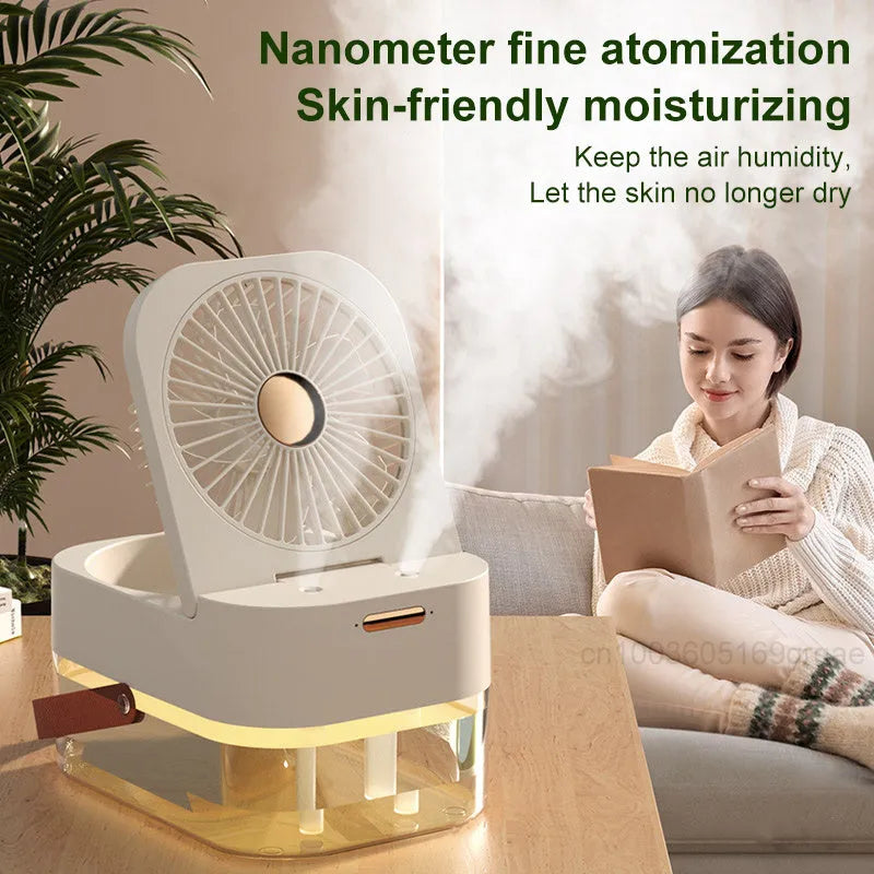 Portable pearl white USB desktop humidifier fan with night light on a wooden desk.