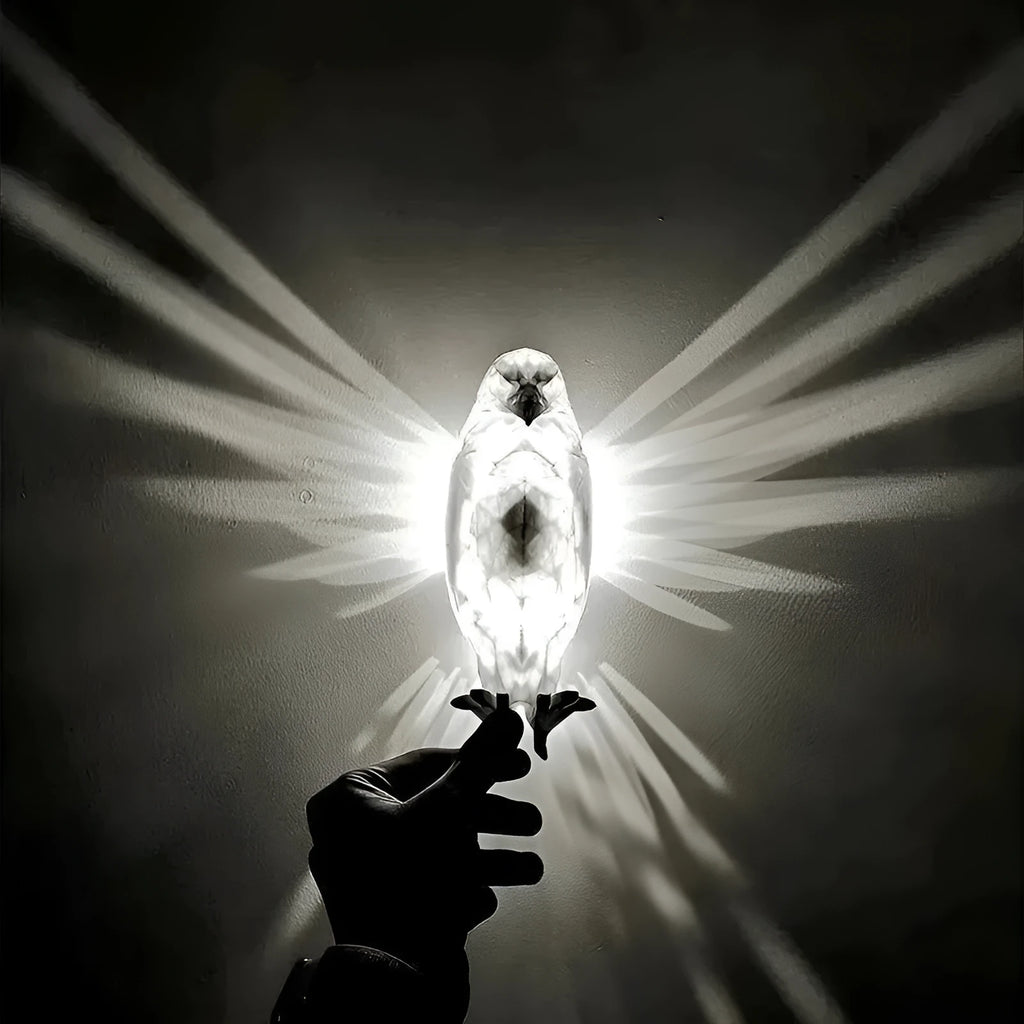 3D printed eagle silhouette wall lamp with multicoloured projection lighting on wall