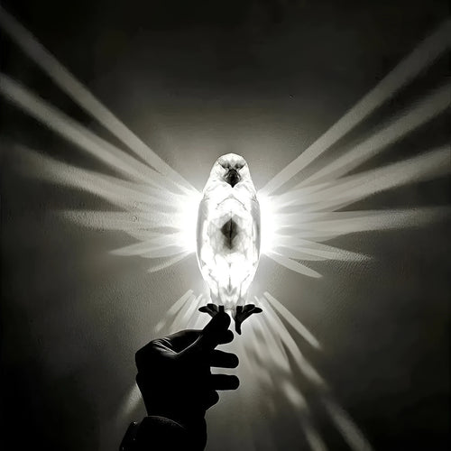 3D printed eagle silhouette wall lamp with multicoloured projection lighting on wall