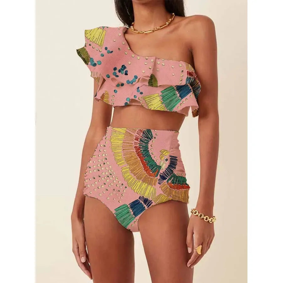 Women's printed bikini with oblique shoulder straps and high-waist briefs in multiple colours
