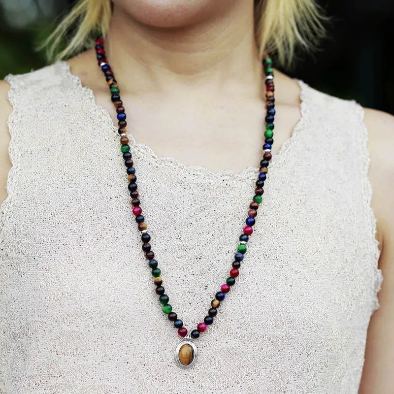 Natural stone meditation necklace with tiger eye pendants and symbolic charms on adjustable ball bead chain
