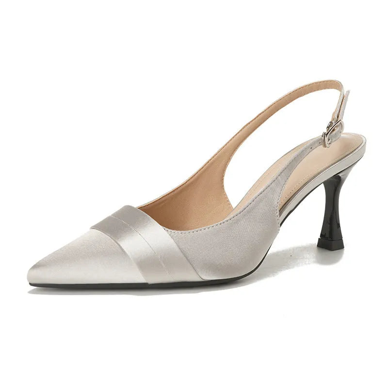 Women's stiletto heel pointed toe closed sandals with wedge heel in black, side view