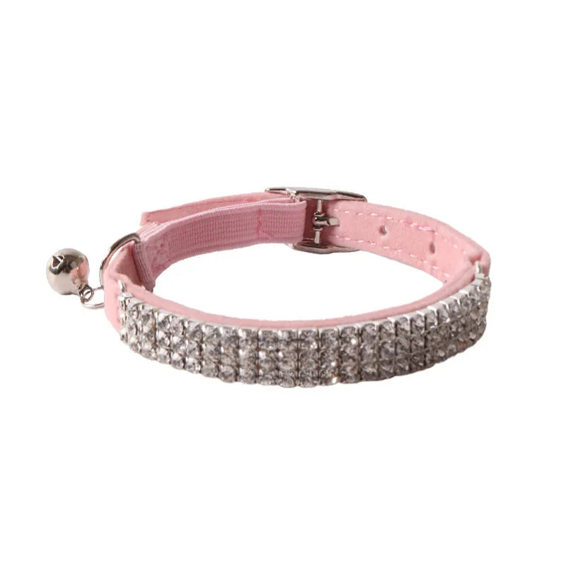 Flocked fabric cat collar with elastic buckle and gang drill pattern in multiple colours.