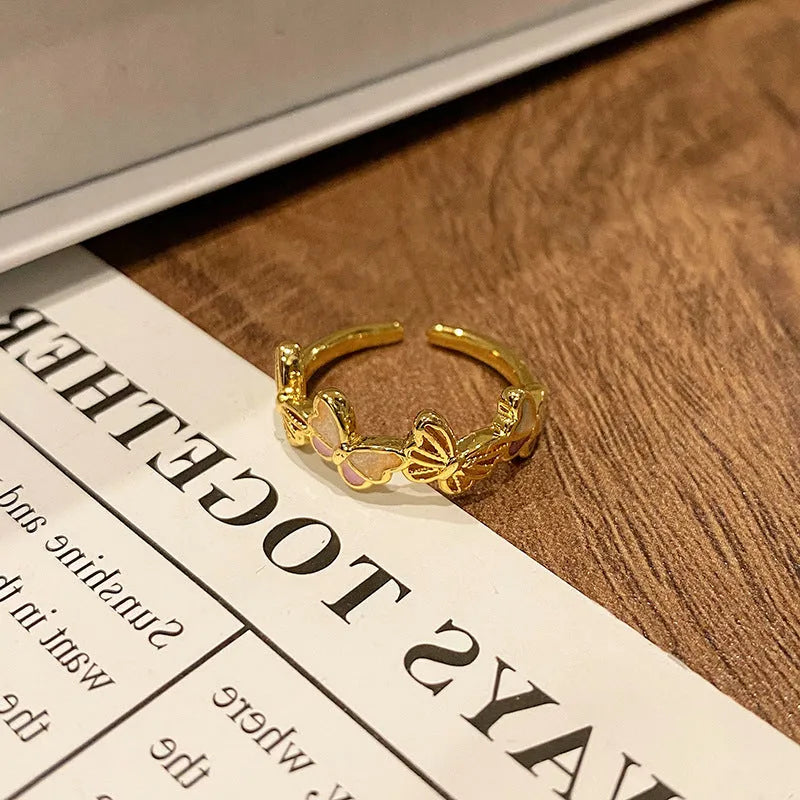 Copper women's ring with Chinese butterfly design and oil-drip finish in simple jewellery style