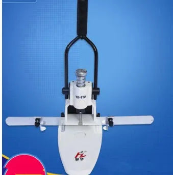 T30 single hole punching machine with adjustable hole pitch and 30mm paper capacity on a desk