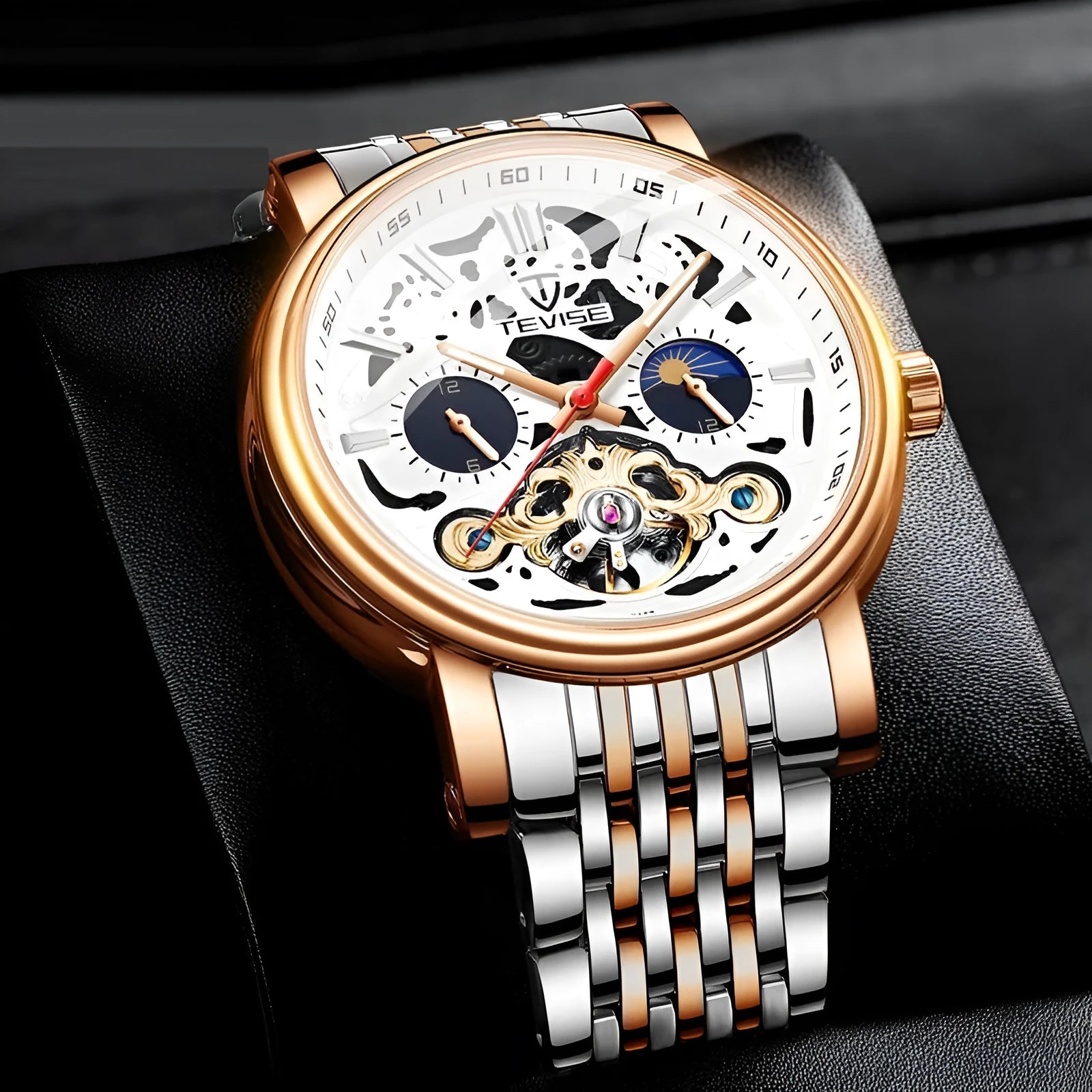 Men's black dial tourbillon mechanical watch with luminous hands on a leather strap.