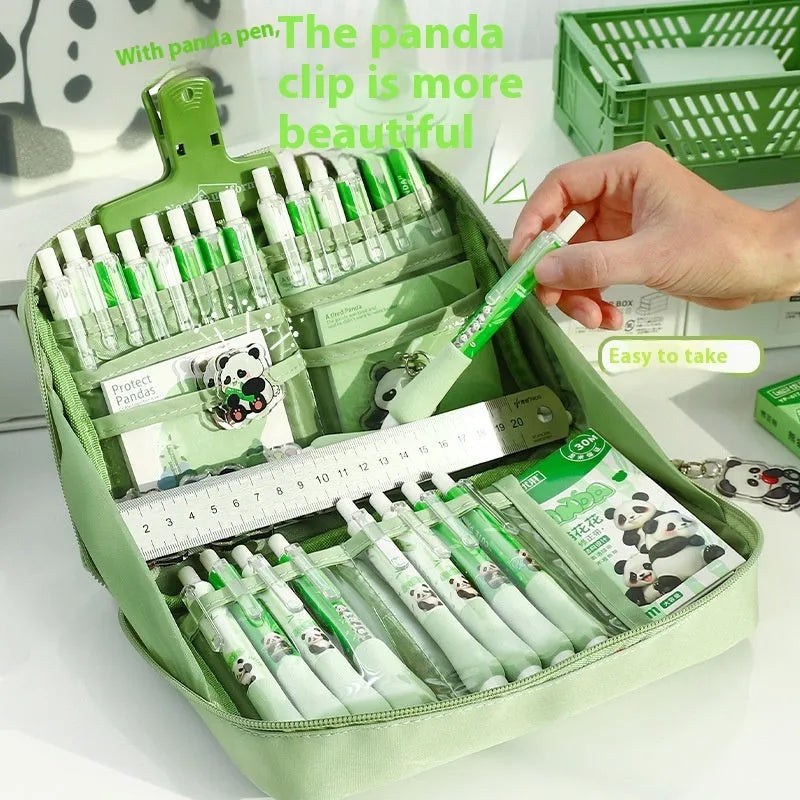 Green Korean-style canvas pencil case showing 12 open layers for organised pen and pencil storage