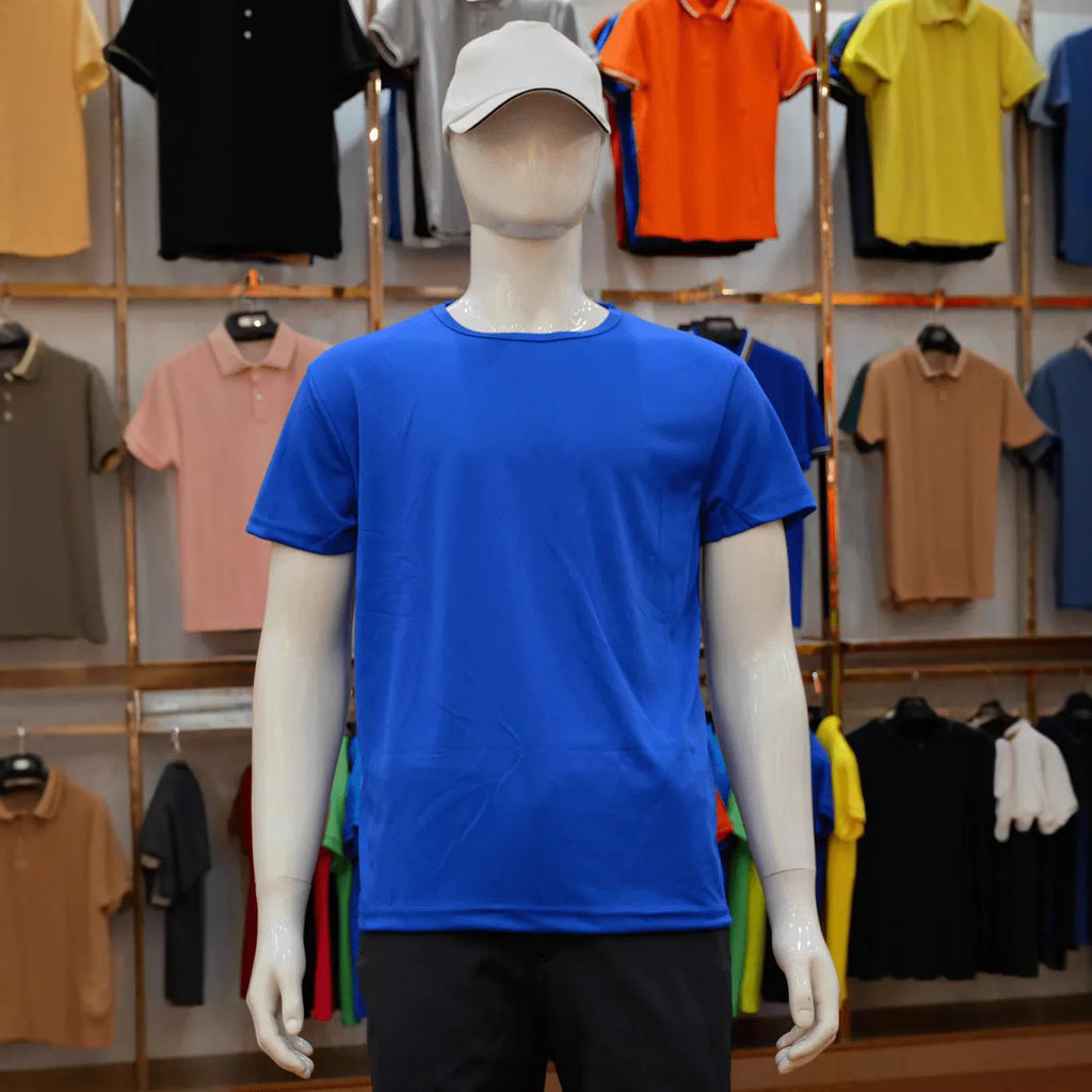 Man wearing a slim fit short sleeve round neck T-shirt in a solid colour.
