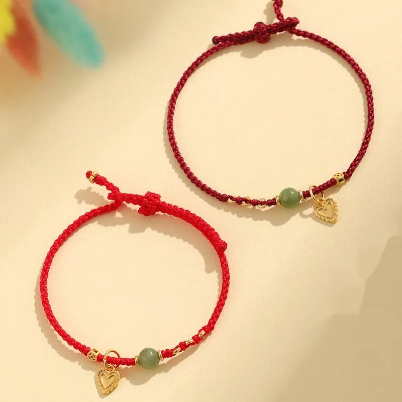 Handmade 925 silver and Hetian jade woven bracelet for women with red strap