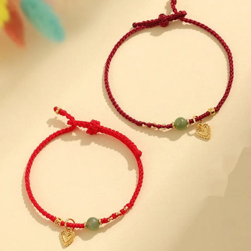 Handmade 925 silver and Hetian jade woven bracelet for women with red strap