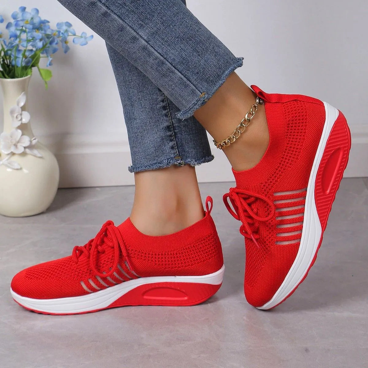 Women's lace-up flat shoes with mesh upper and platform heel in black, dark blue, or red colour options