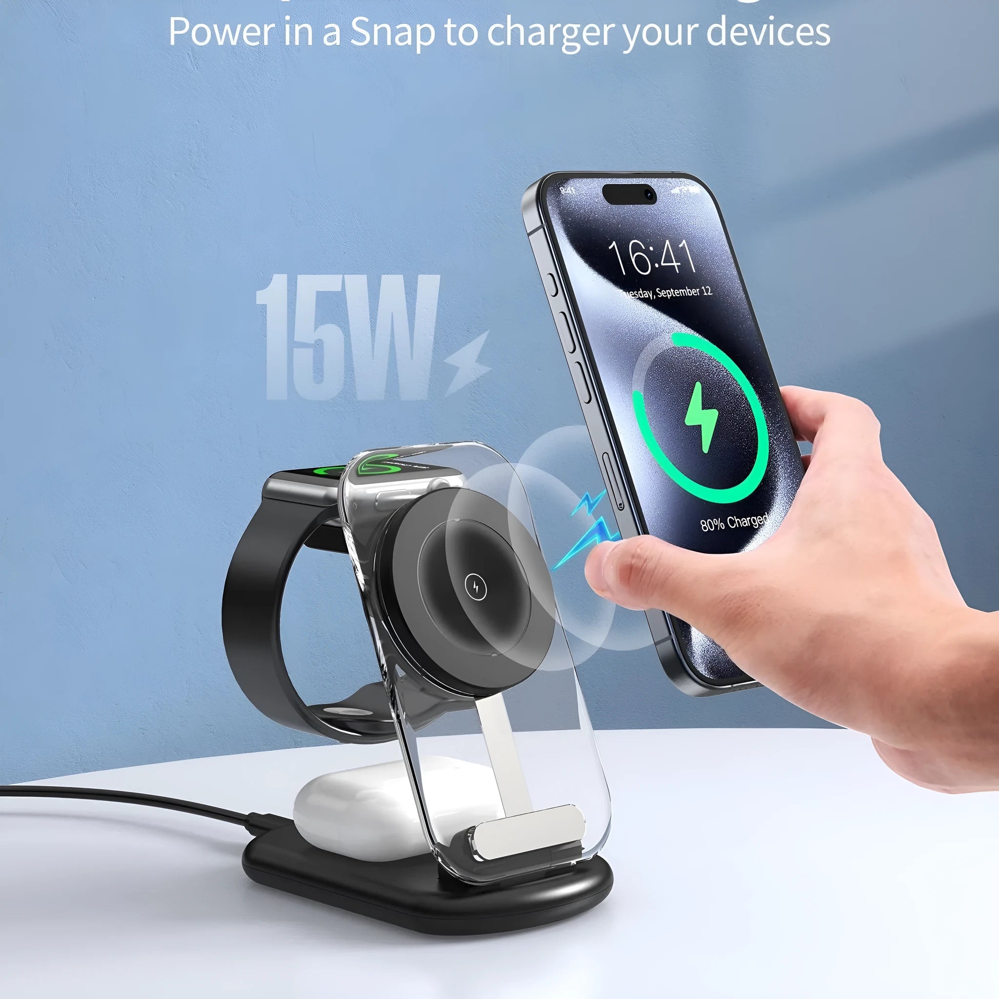 Clear folding wireless charger showing three internal coils, propped upright charging a mobile phone.