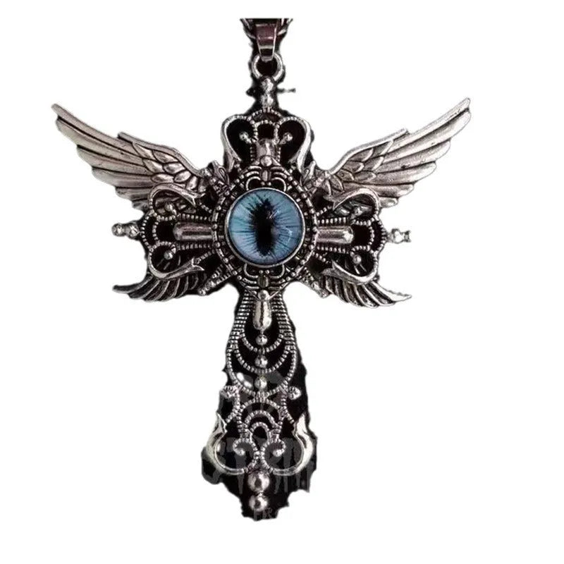 Close-up of a silver-coloured geometric pendant with wing details and a central cross on a chain.