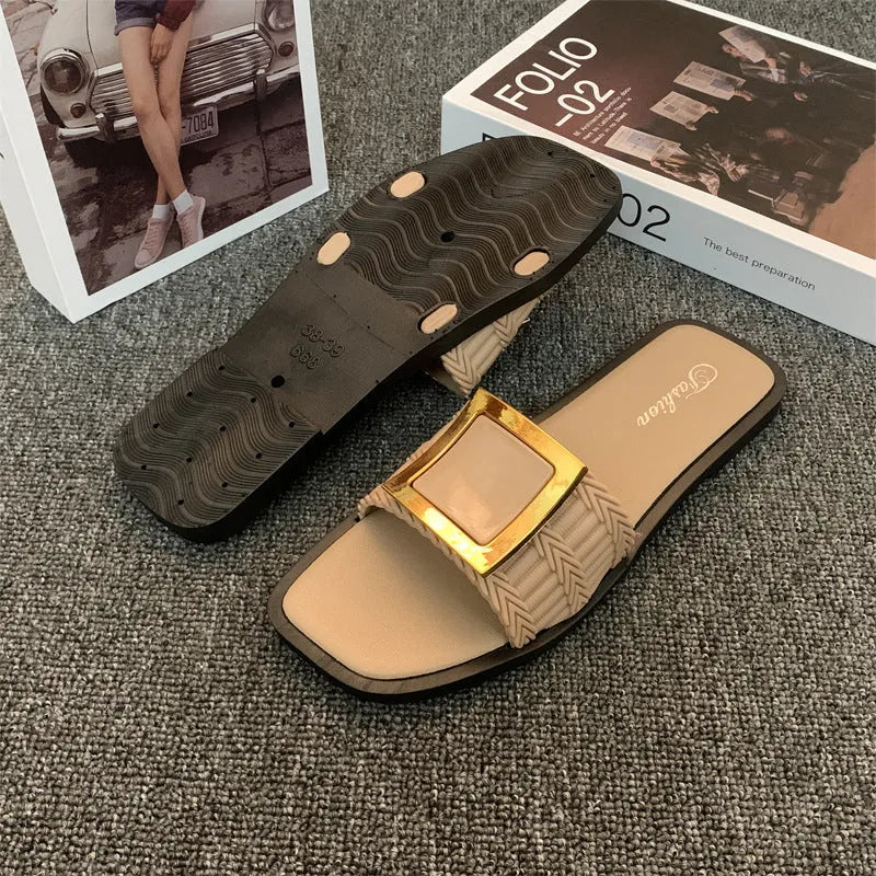 Women's apricot coloured flat summer slippers with a textured PVC sole.
