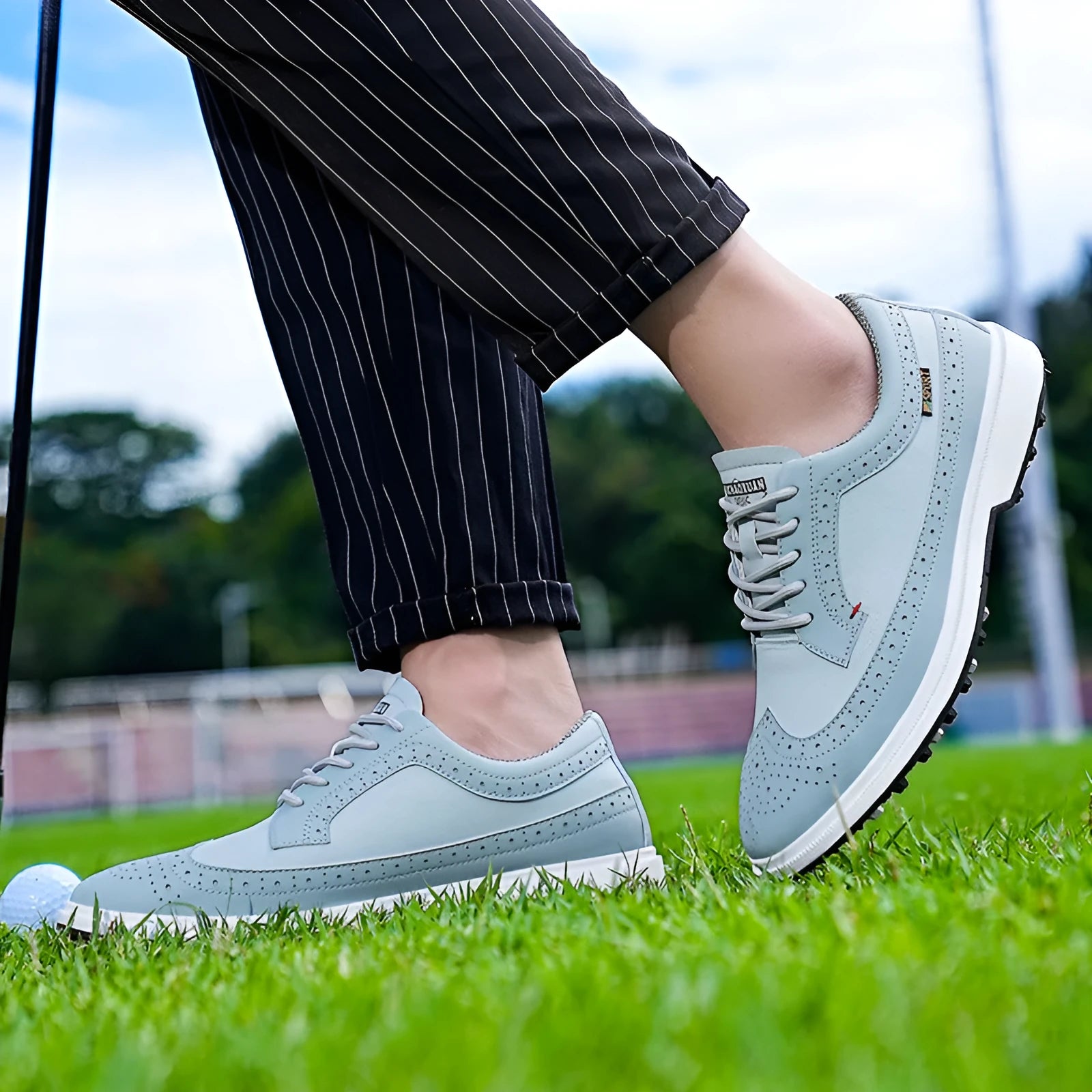 Men's genuine leather golf shoe with non-slip rubber outsole in Lake Blue or White.