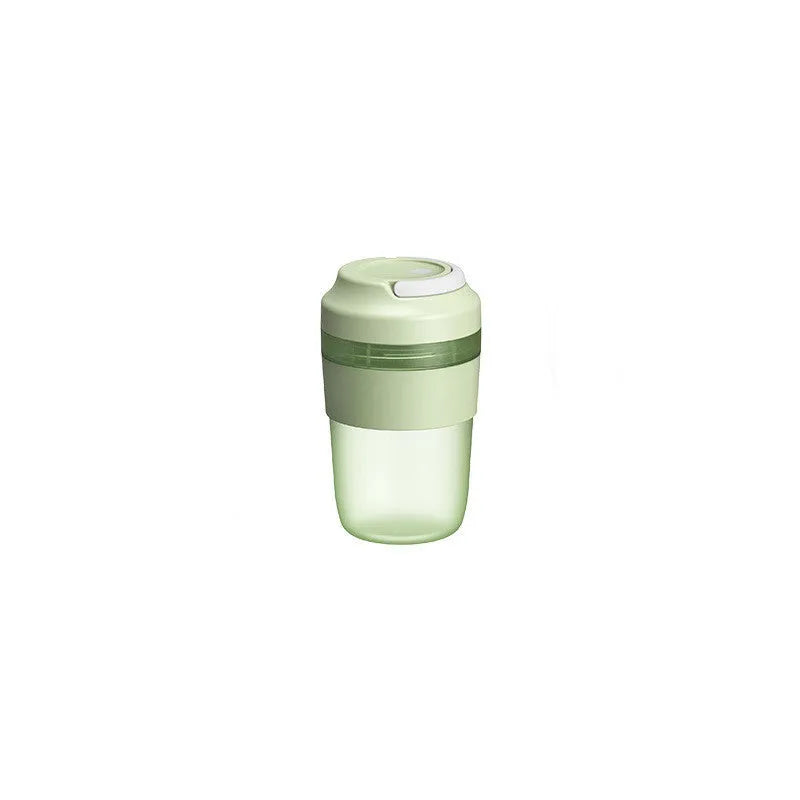 Portable purple blender cup with four stainless steel blades and a USB charging cable