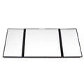 Silver folding car makeup mirror shown both closed and open on a car dashboard.