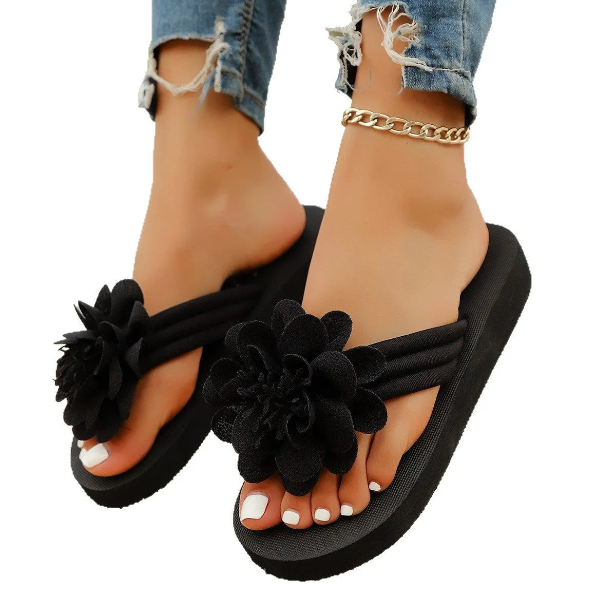 Women's beige flip-flops with a red flower decoration on the strap and a lightweight EVA sole.