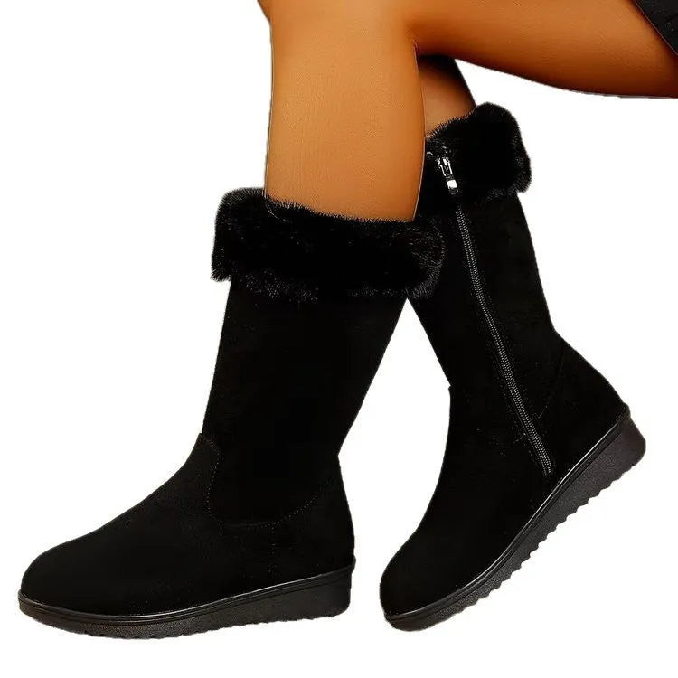 Fleece-lined mid-calf snow boots in black with waterproof platform sole and round toe, on a white background