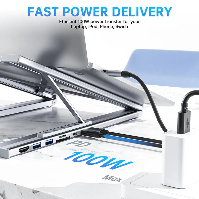 Folding aluminum alloy laptop stand with integrated 8-in-1 docking hub and HDMI ports.