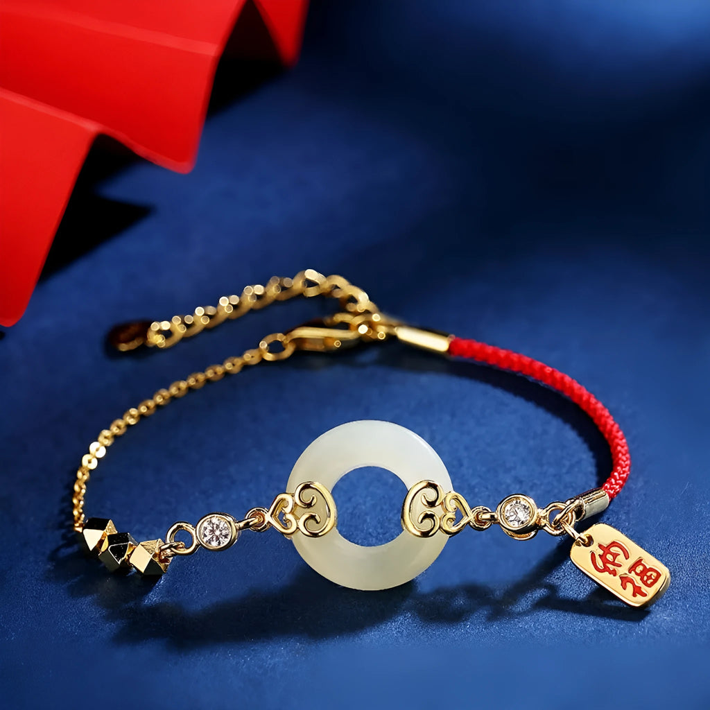 Hetian jade gourd bracelet, necklace, and earrings set in sterling silver with Fu Lu symbols.