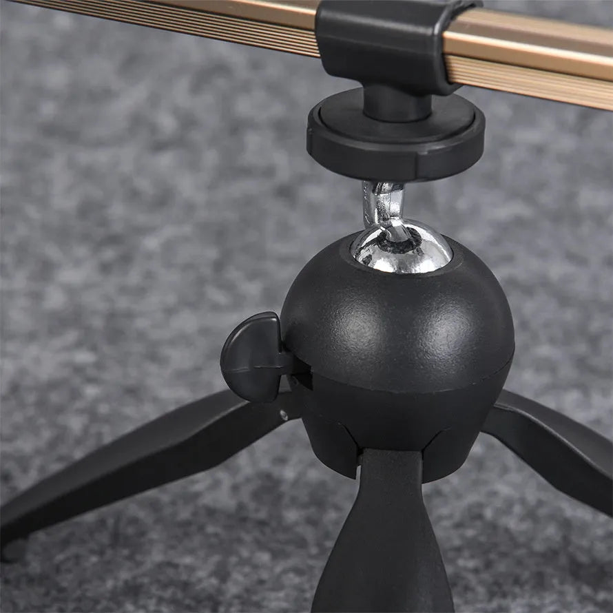 Aluminium alloy ice fishing rod holder tripod bracket on ice.
