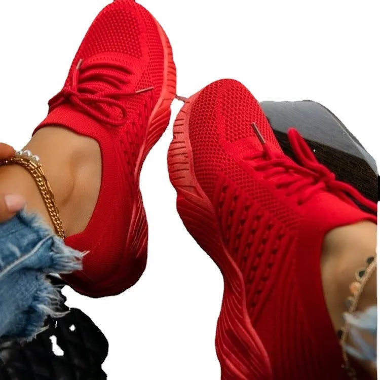 Women's sneakers with thick rubber soles in eight colour options including white, red, blue, black, khaki, grey, pink, and light blue