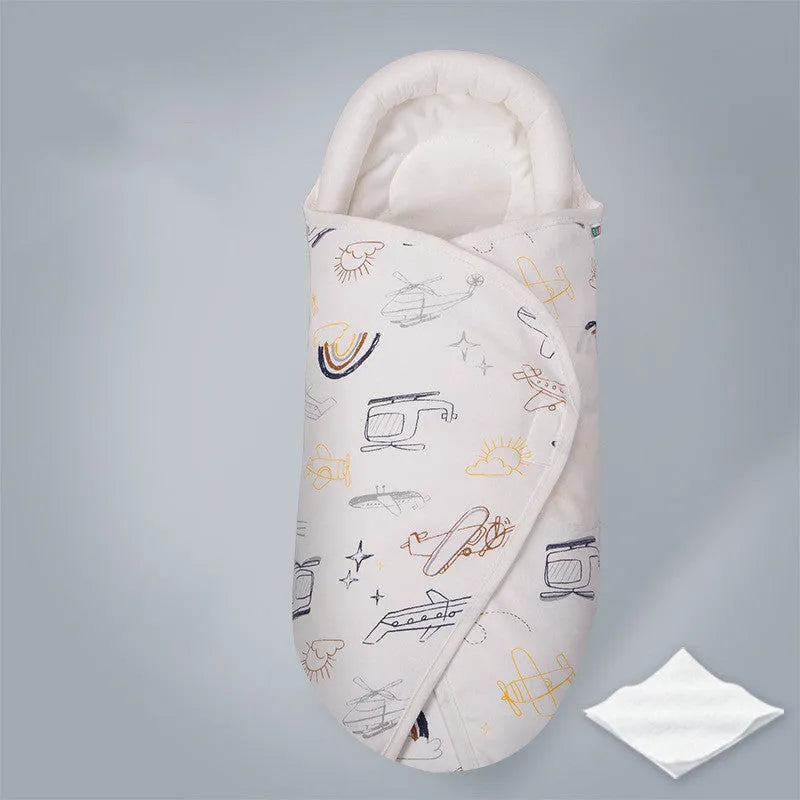 Cotton baby anti startle swaddle measuring 30 by 60 centimetres in a colourful print design.