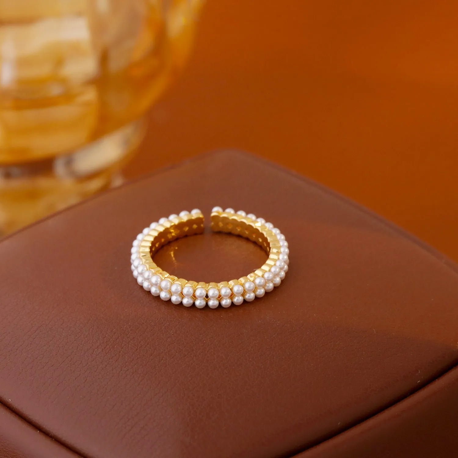 Gold geometric open mouth women's ring with round elements and electroplated copper construction