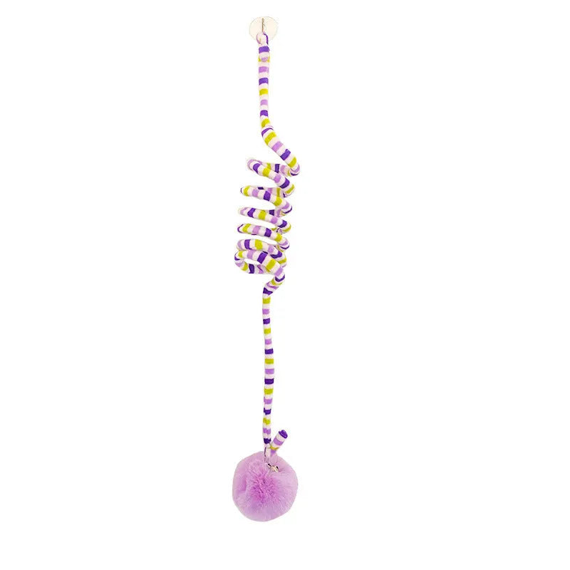 Hanging cat toy with coloured inflatable ball and suction cup attachment for doors and windows