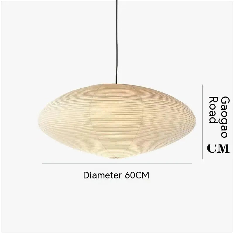 Modern simplicity paper pendant lamp with a round paper shade, shown in a dining room setting.